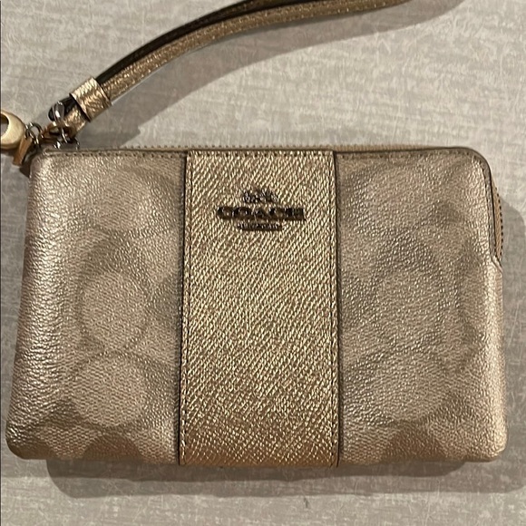 Coach Handbags - NWOT Coach Beige Monogram Wristlet Adjustable Wrist Strap 4X6”